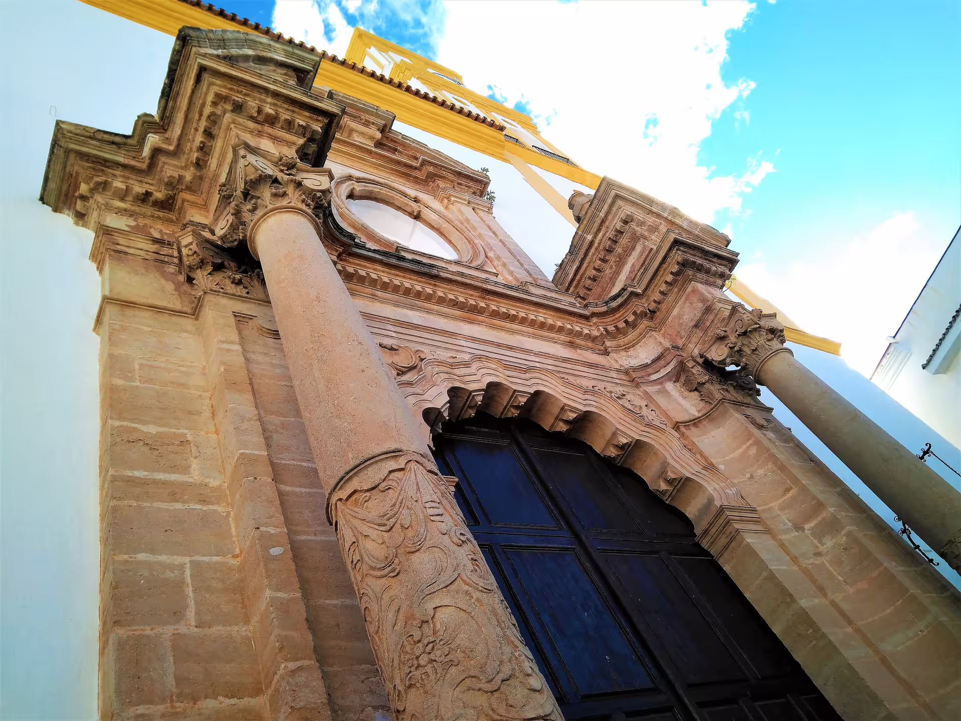 Baroque church facade in Mijas Pueblo, featured on the Mijas, Marbella and Puerto Banus group tour with Costa del Sol pickup