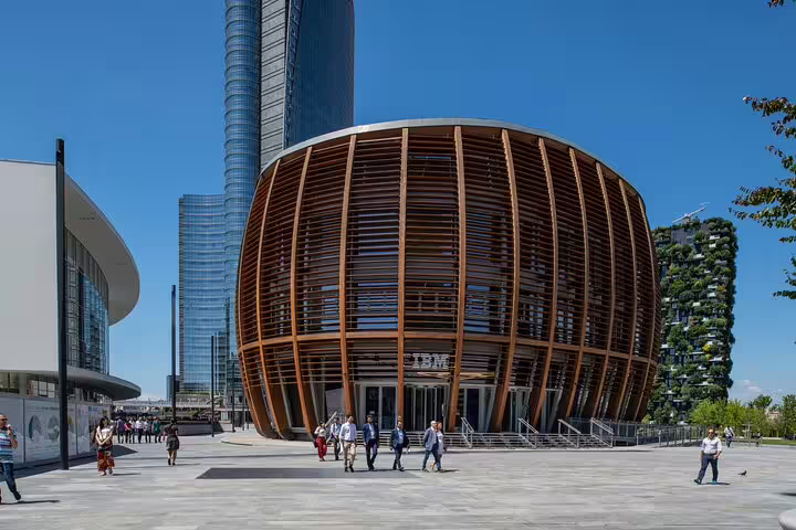 Modern architecture in Milan's Porta Nuova district, featuring the iconic IBM building, perfect for a 2-hour private city tour.