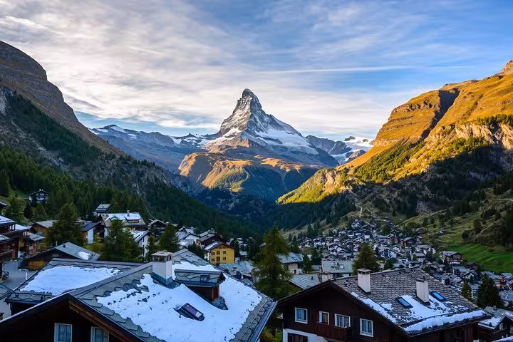 Scenic view of Zermatt village with the iconic Matterhorn mountain in the background, perfect for Milan to Zermatt transfer.