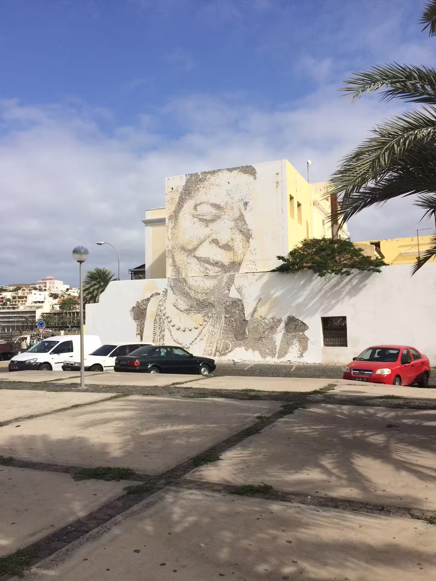 Street art mural on a sunny day in Mindelo, São Vicente, showcasing cultural highlights on a full-day shore excursion.