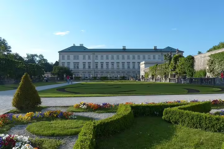 Mirabell Palace and Gardens in Salzburg on a private day trip from Vienna, manicured lawns and flowers