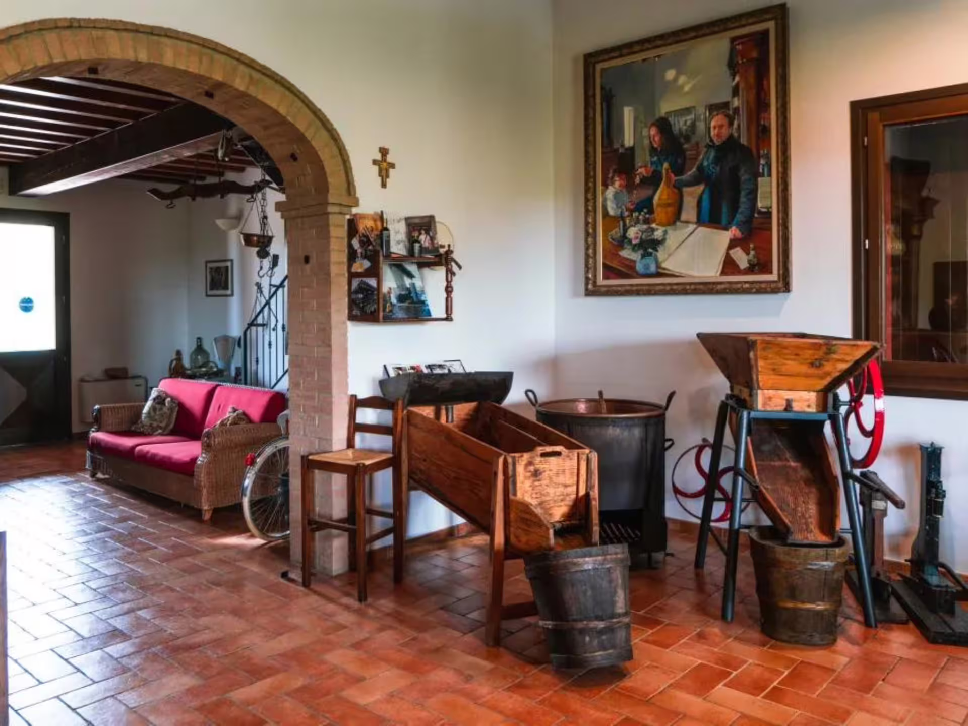 Traditional acetaia room with vintage tools on a Modena balsamic vinegar tasting and production tour