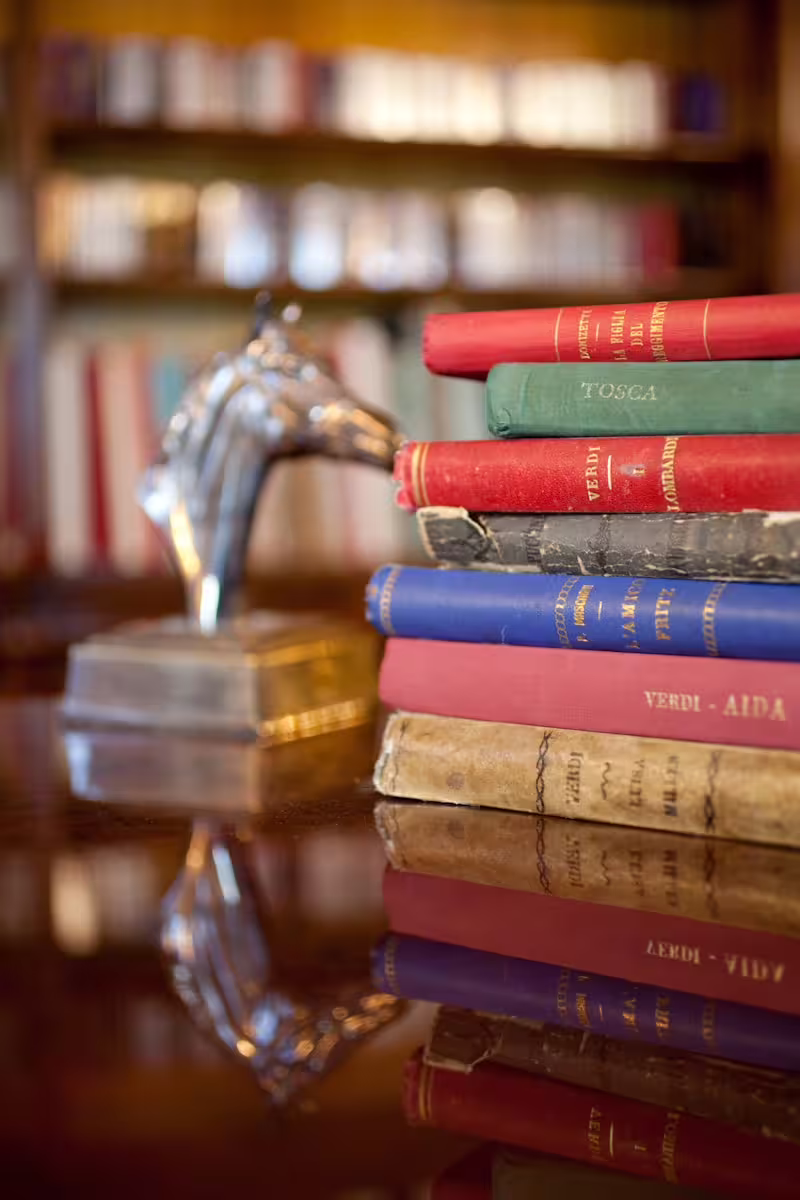 Vintage opera books and memorabilia at Museo Pavarotti Modena, part of Ferrari Museums combo ticket