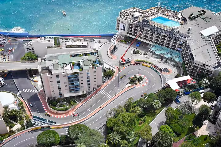 Aerial view of Monaco's iconic Grand Prix circuit with coastal backdrop, ideal for private luxury tours.