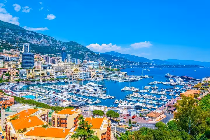 Scenic panorama of Monaco's luxurious marina and cityscape along the French Riviera, perfect for a bespoke tour.