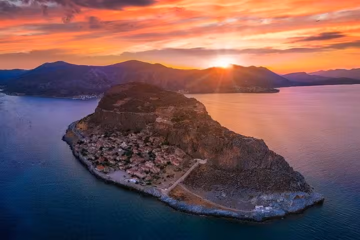 Sunset aerial view of Monemvasia castle town peninsula, highlight of a 2-day Mystras Sparta private tour