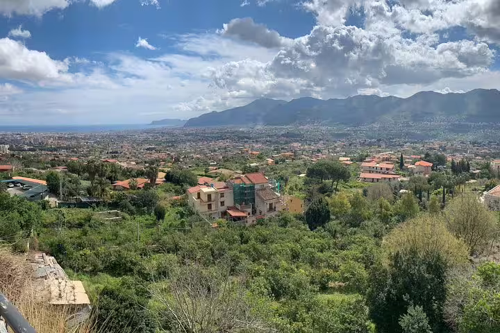 Panoramic view from Monreale over Palermo’s countryside, red-roofed villas and Tyrrhenian Sea on a private Sicily day trip