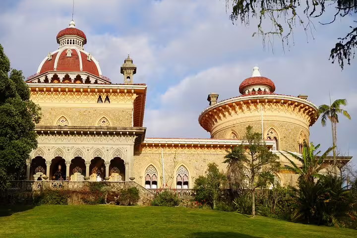 Monserrate Palace in Sintra, Portugal, showcasing stunning architecture and lush gardens on a full-day private tour to Cascais and Cabo da Roca.