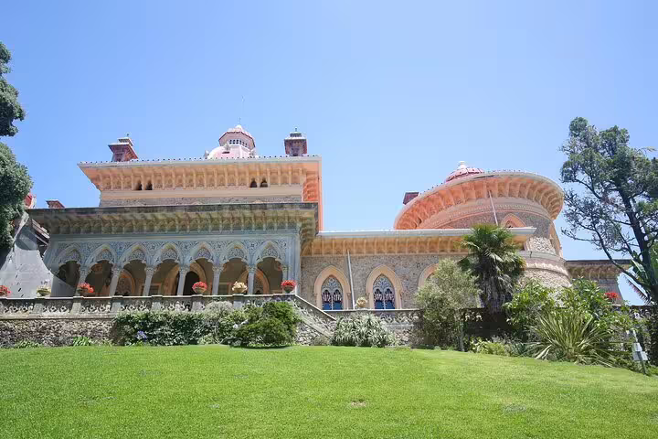 Monserrate Palace in Sintra, showcasing its intricate architecture and lush gardens, a highlight of the Sintra day tour from Lisbon.