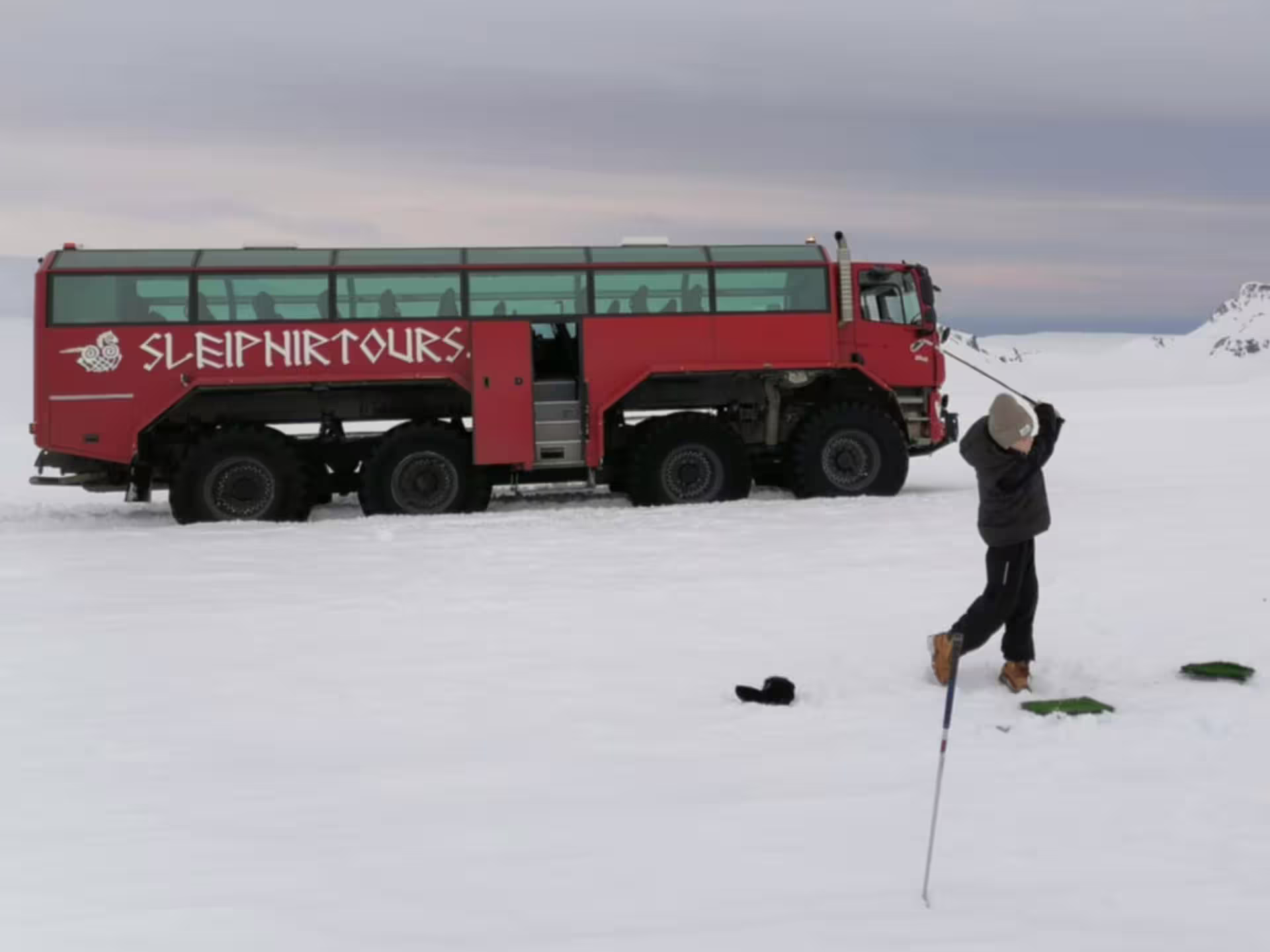 Glacier super truck parked on ice during Golden Circle + monster truck glacier adventure from Reykjavik
