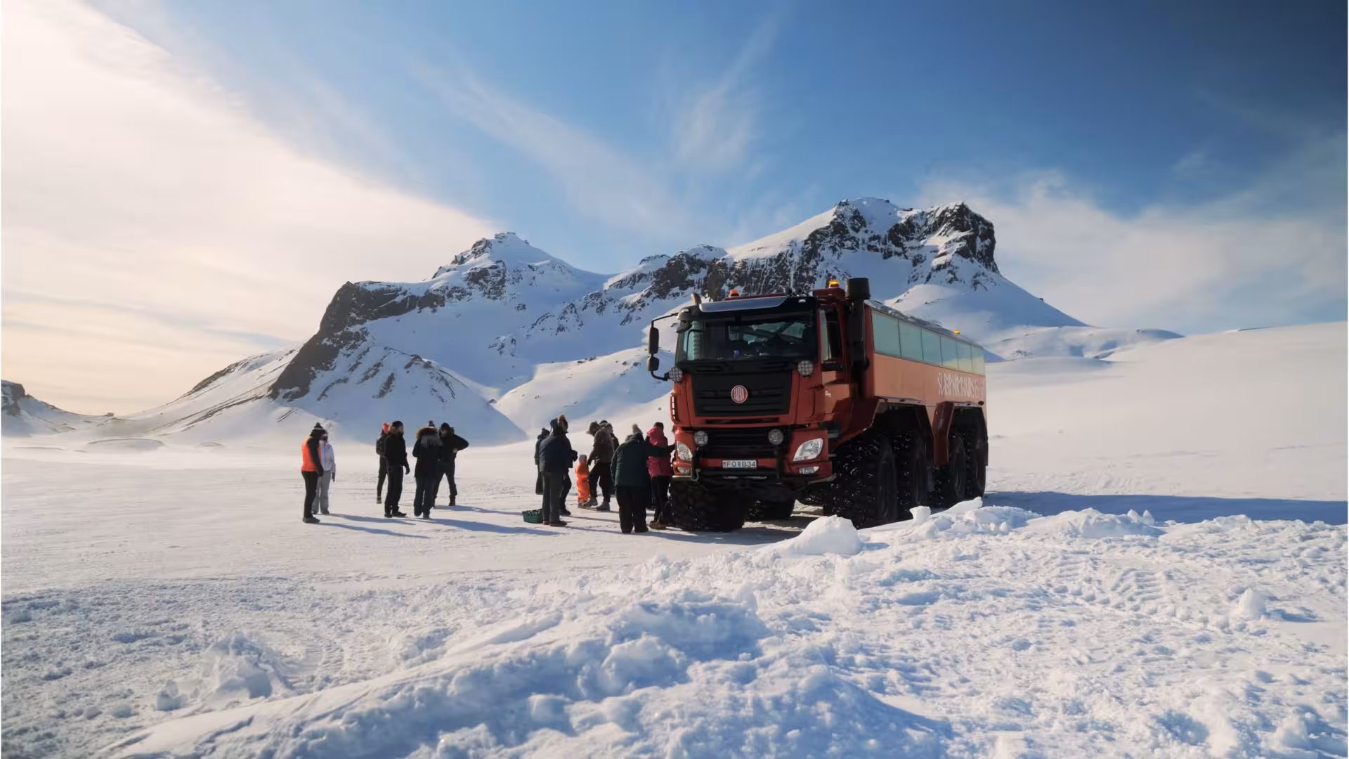 Monster truck on Iceland glacier with guests, Golden Circle & ice cave tour from Reykjavik in winter