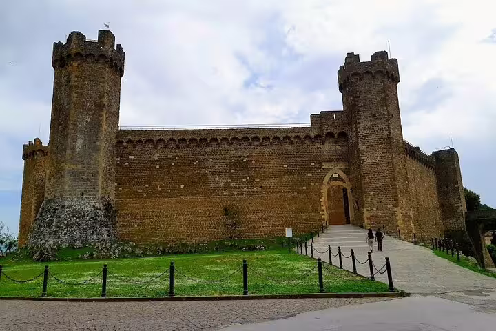 Historic stone fortress in Montalcino, Tuscany, a scenic stop on Siena, Chianti and Brunello wine tasting day trips