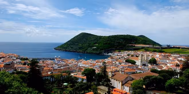 Monte Brasil half-day walking tour view over Angra do Heroísmo bay, Terceira Azores, and green volcanic hills