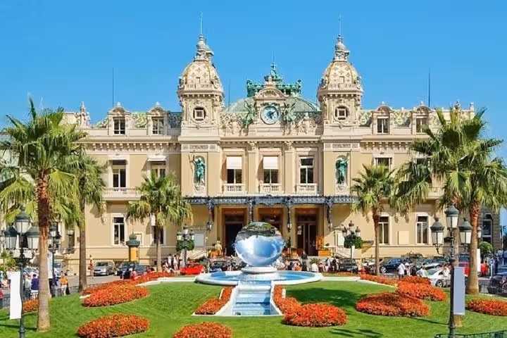 Monte Carlo Casino in Monaco with palm gardens, a highlight on a private Marseille shore excursion day trip