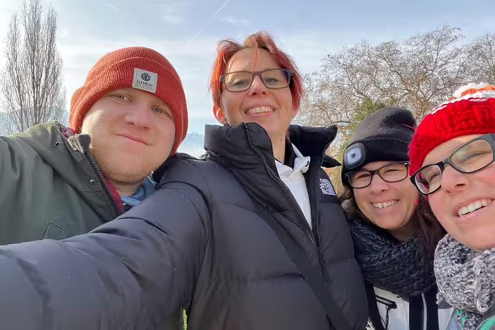 Friends selfie by Lake Geneva on Montreux scavenger hunt self-guided tour, enjoying Swiss Riviera views