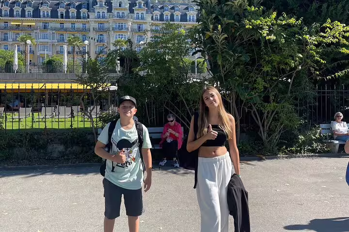 Teens on Montreux scavenger hunt and sights self-guided tour near lakeside gardens and historic grand hotel