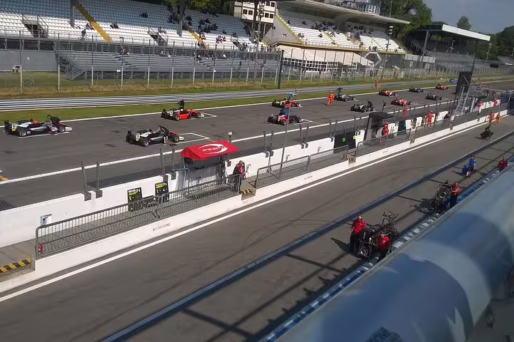 Monza Formula 1 circuit pit lane and race cars, add-on for a Milan to Monza private half-day tour