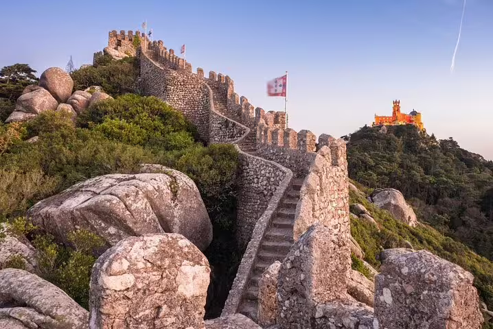 Explore the enchanting Moorish Castle in Sintra with panoramic views, part of the Sintra & Cascais Hidden Gems Private Tour.