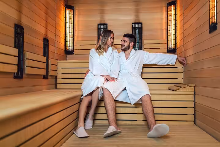 Couple relaxing in sauna during Moroccan bath experience in Hurghada with steam, jacuzzi and massage package