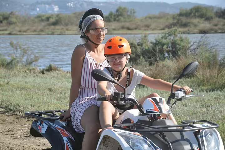 Mother and child enjoying a scenic quad ride near Kusadasi Port, perfect for family-friendly cruise excursions.