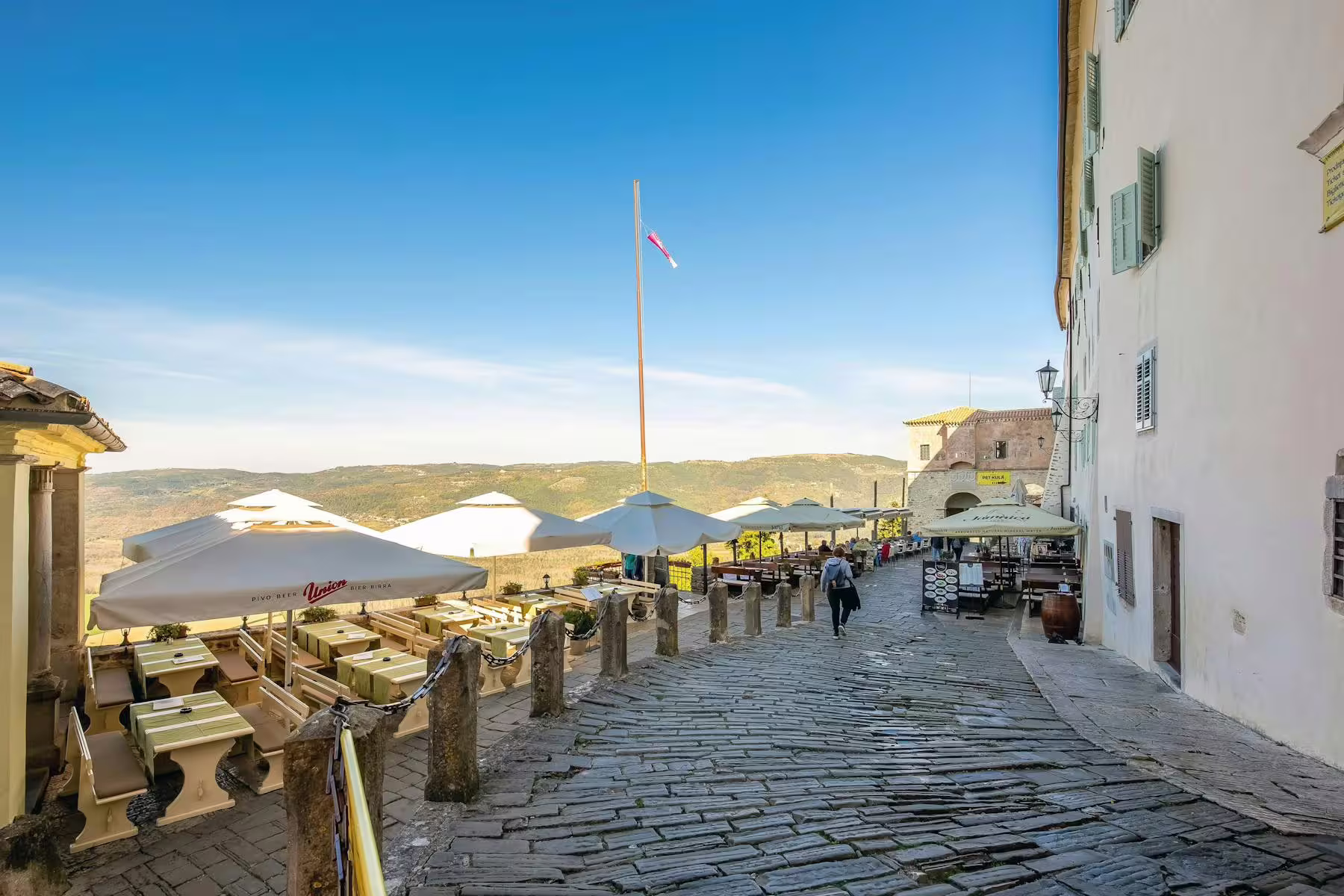 Motovun hilltop terrace cafes with Istrian valley views, part of half-day trip with truffle and brandy tasting