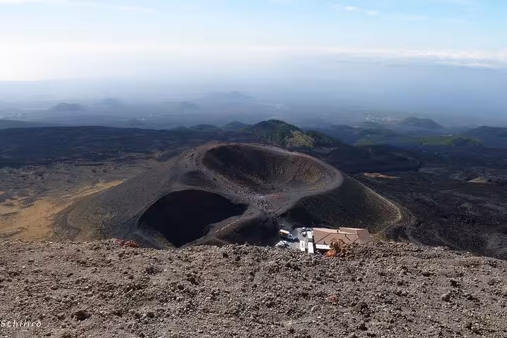 Panoramic view of Mount Etna's craters and volcanic landscape, offering an exciting glimpse of Sicily's iconic volcano.