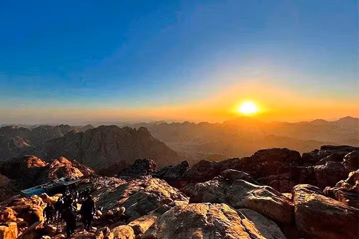 Sunrise view over Sinai mountains from Mount Moses near Saint Catherine Monastery, then Dahab day tour