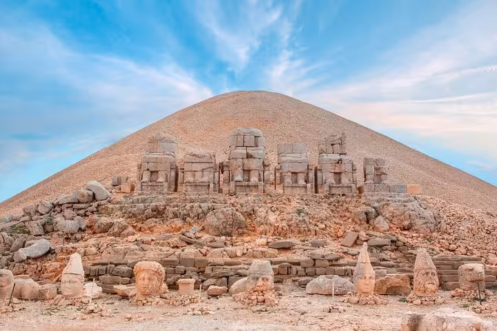 Mount Nemrut summit statues and tumulus at sunrise, highlight of 2-day 1-night tour from Istanbul