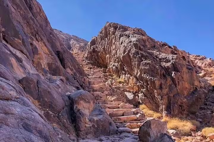 Stone steps climbing Mount Sinai in Egypt’s Sinai Desert, hiking route on private Sharm to St Catherine tour
