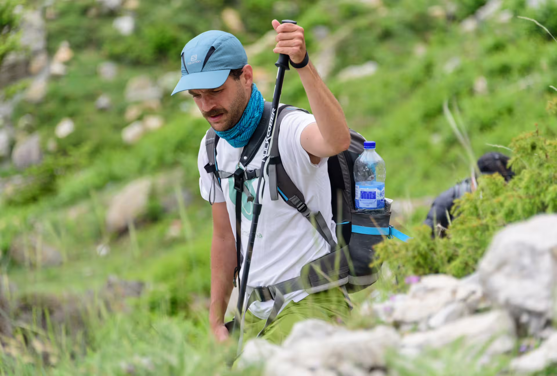 Hiker with trekking pole on Mount Taygetos trail, guided summit hike to Profitis Ilias peak 2407m