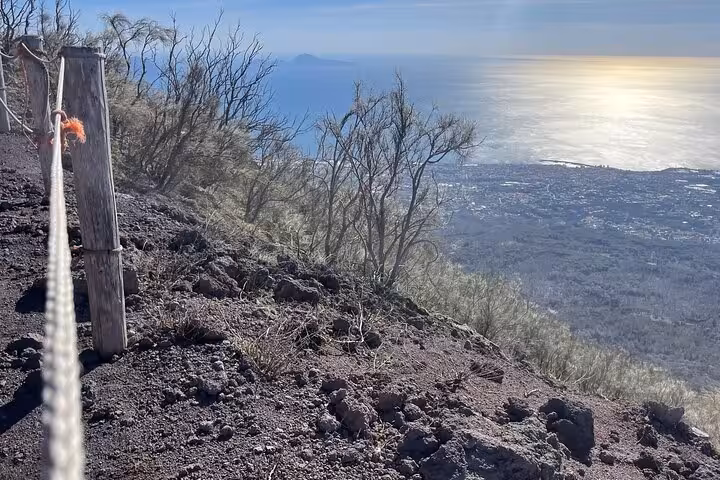 Breathtaking view from Mount Vesuvius overlooking the coast, featured in the Amalfi Coast wine tasting tour.