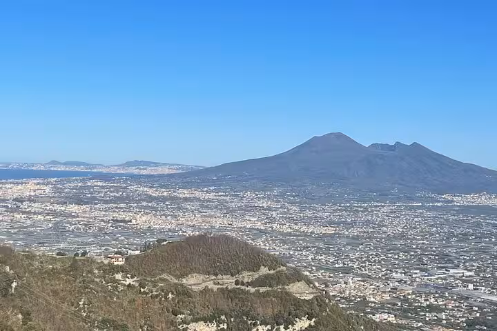 Marvel at the panoramic view of Mount Vesuvius and surrounding landscape from the Amalfi Coast wine tasting tour.