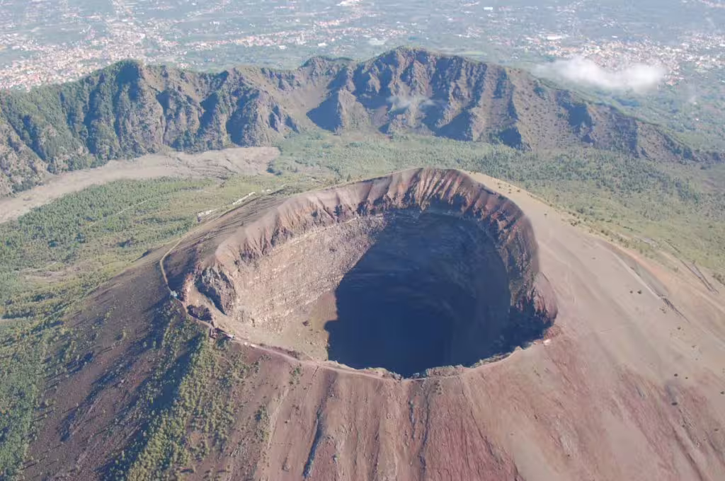 Aerial view of Mount Vesuvius crater near Naples, featured on a guided Pompeii and Vesuvius day tour with lunch included
