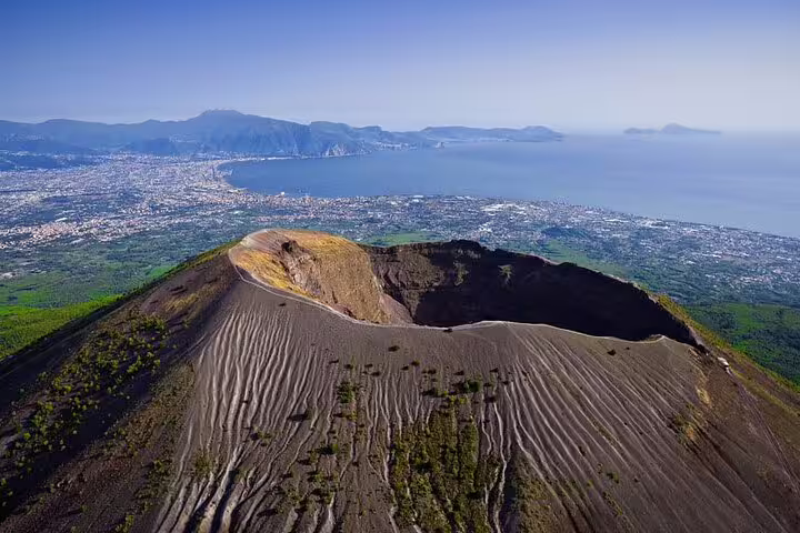 Aerial view of Mount Vesuvius crater overlooking the Bay of Naples on a Private Tour Positano Pompei Vesuvio day trip