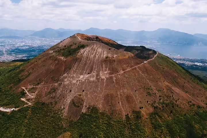 Aerial view of Mount Vesuvius crater and hiking trail on private full day tour from Pompeii, Herculaneum and winery