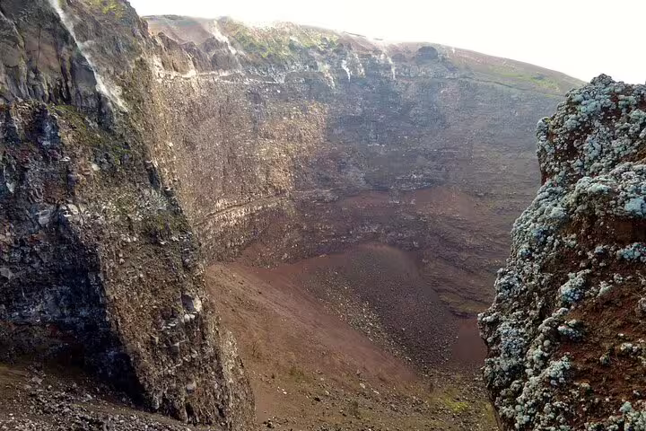Inside the Mount Vesuvius crater rim, rocky caldera view on VIP small-group tour with included entry ticket