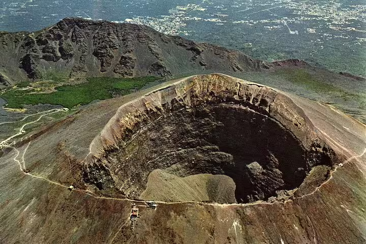 View into Mount Vesuvius crater from summit trail, top highlight on Vesuvius group tour from Naples