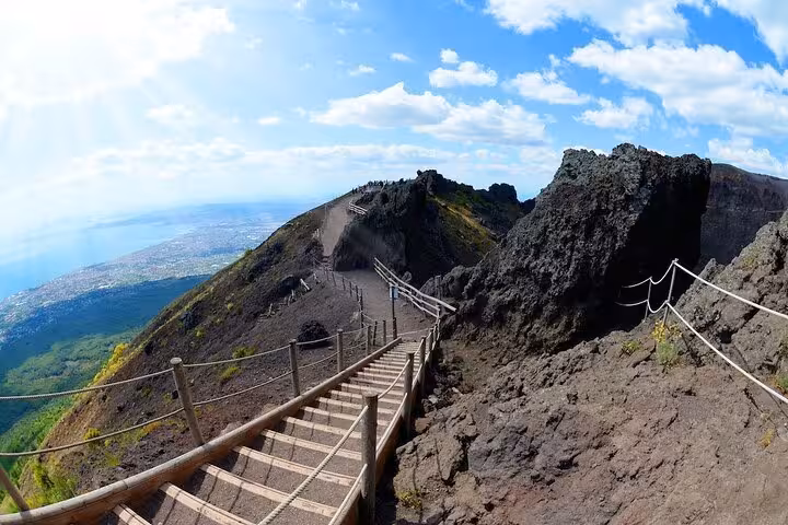 Stunning view from the wooden path leading to Mount Vesuvius crater, highlighting the adventure of the Vesuvius tour.