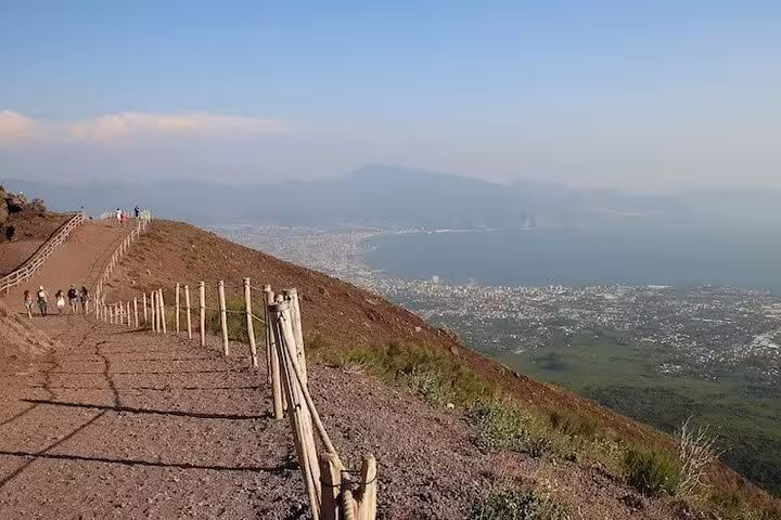 Hiking trail on Mount Vesuvius with Naples Bay views on VIP small-group tour including ticket