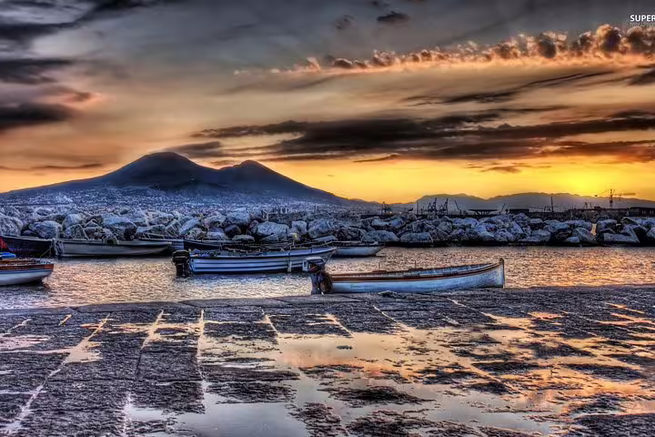 Mount Vesuvius at sunset from Naples waterfront, scenic view for Vesuvius group tour from Naples