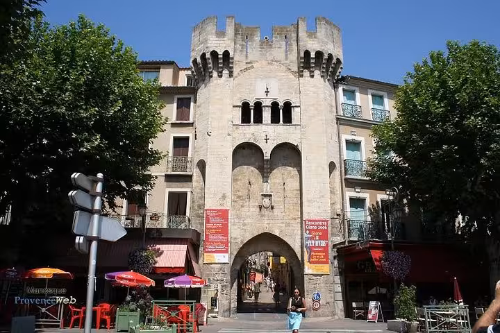 Historic stone gate in Moustiers-Sainte-Marie old town, Provence stop on private day trip from Marseille