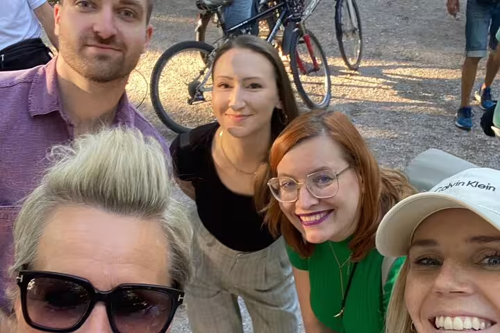 Friends taking a selfie during a Munich scavenger hunt self-guided tour, city sights and teamwork outdoors