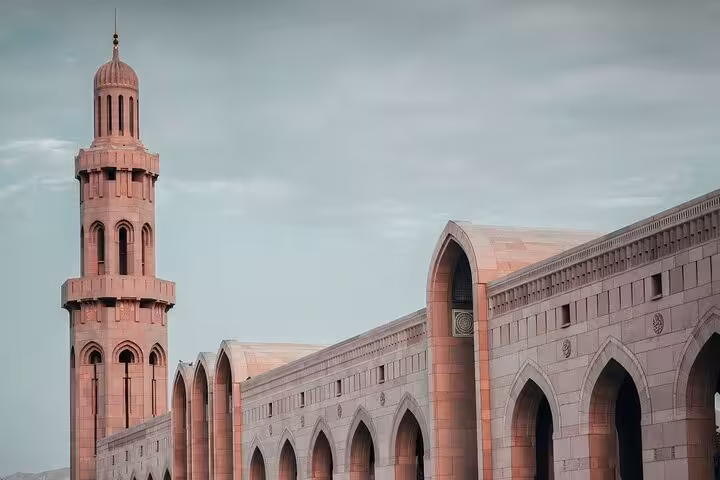 Elegant mosque architecture near Muscat International Airport, ideal landmark view during private Muscat airport transfer service