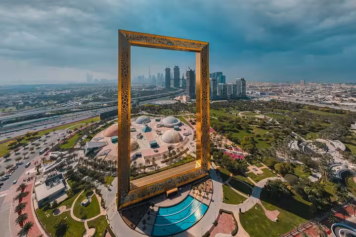 Aerial view of Dubai Frame and Zabeel Park, featured stop on Muscat to Dubai private transfer panoramic city tour