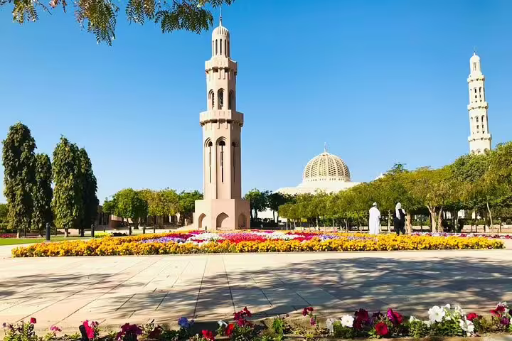 Beautiful garden and architecture of Muscat's Grand Mosque, a must-see on a private sightseeing tour.
