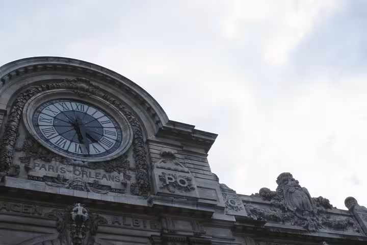 Exterior clock facade of Musée d'Orsay in Paris, a key stop on the private Seine walk with timed entry tickets