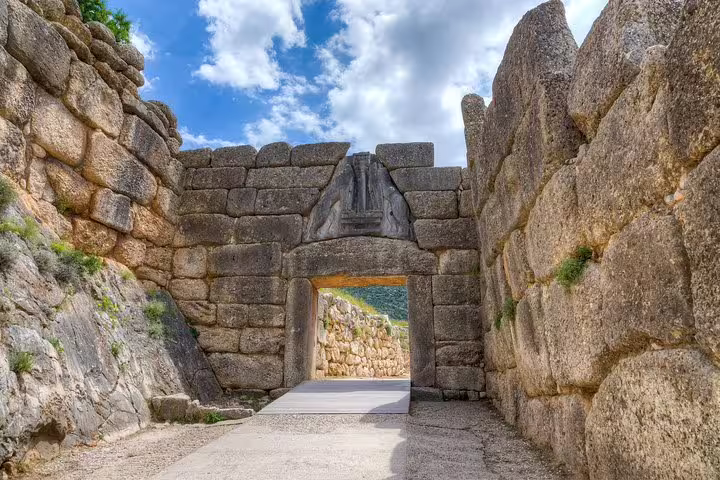 Ancient Mycenae entrance stone passage on full-day private tour from Athens to Mycenae Epidaurus and Nafplio