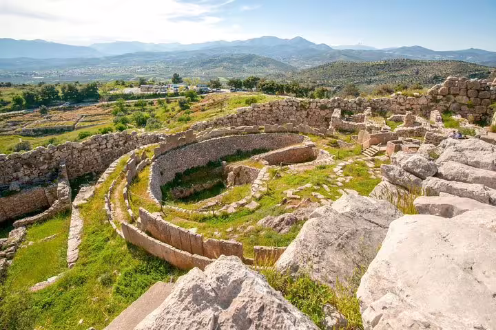 Ancient theater ruins at Mycenae with panoramic valley views, featured on an Argolis private full day tour
