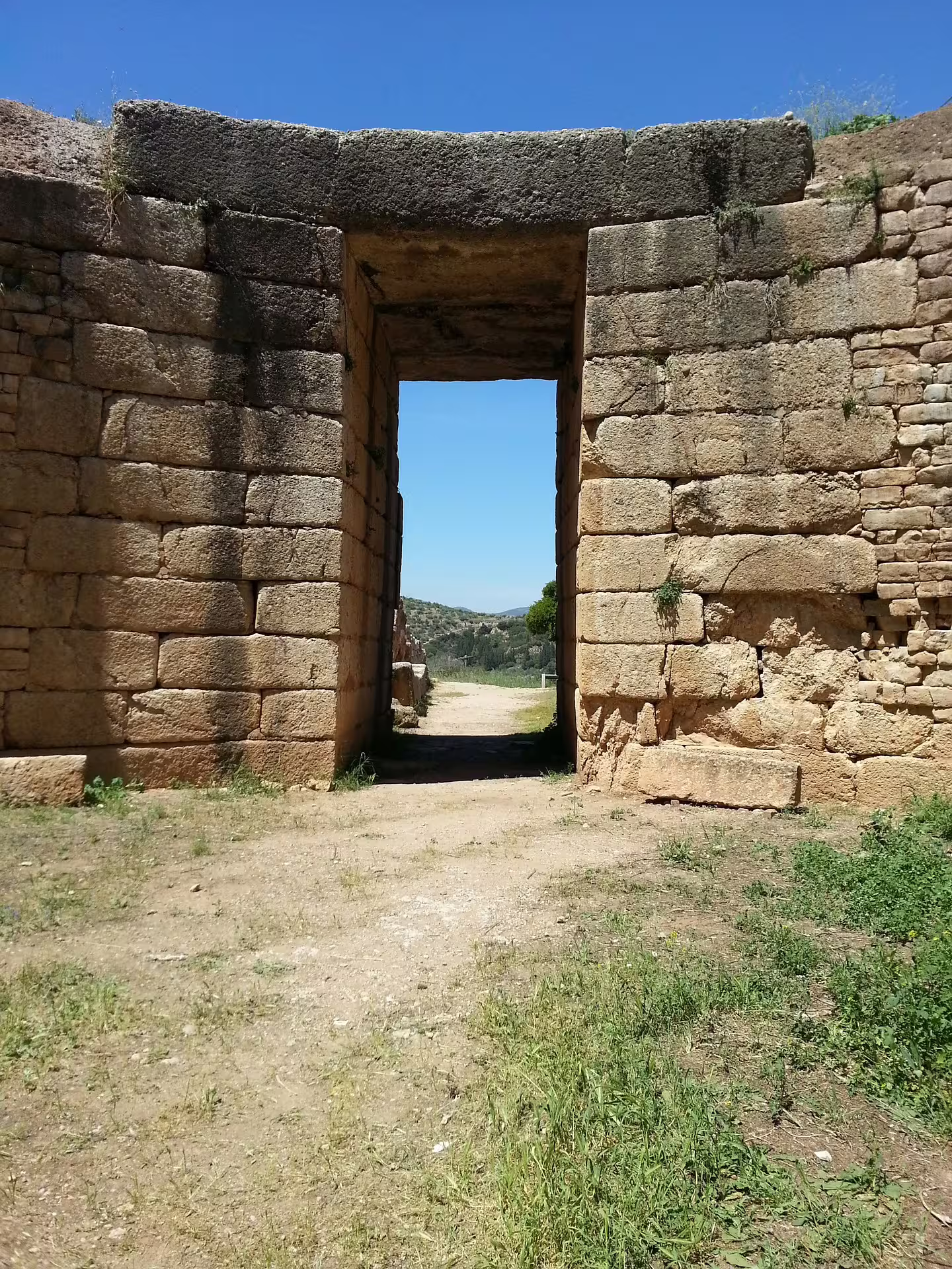 Cyclopean stone gateway at Mycenae archaeological site, visited on a private Athens day tour via Corinth Canal