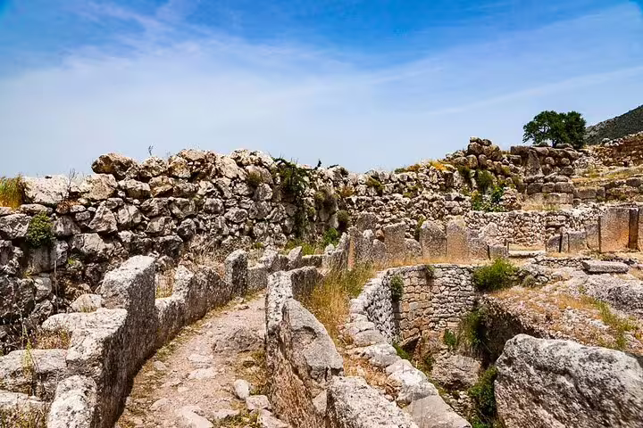 Stone pathways and ancient Mycenae ruins in Peloponnese, Greece, featured on a 2-day guided tour